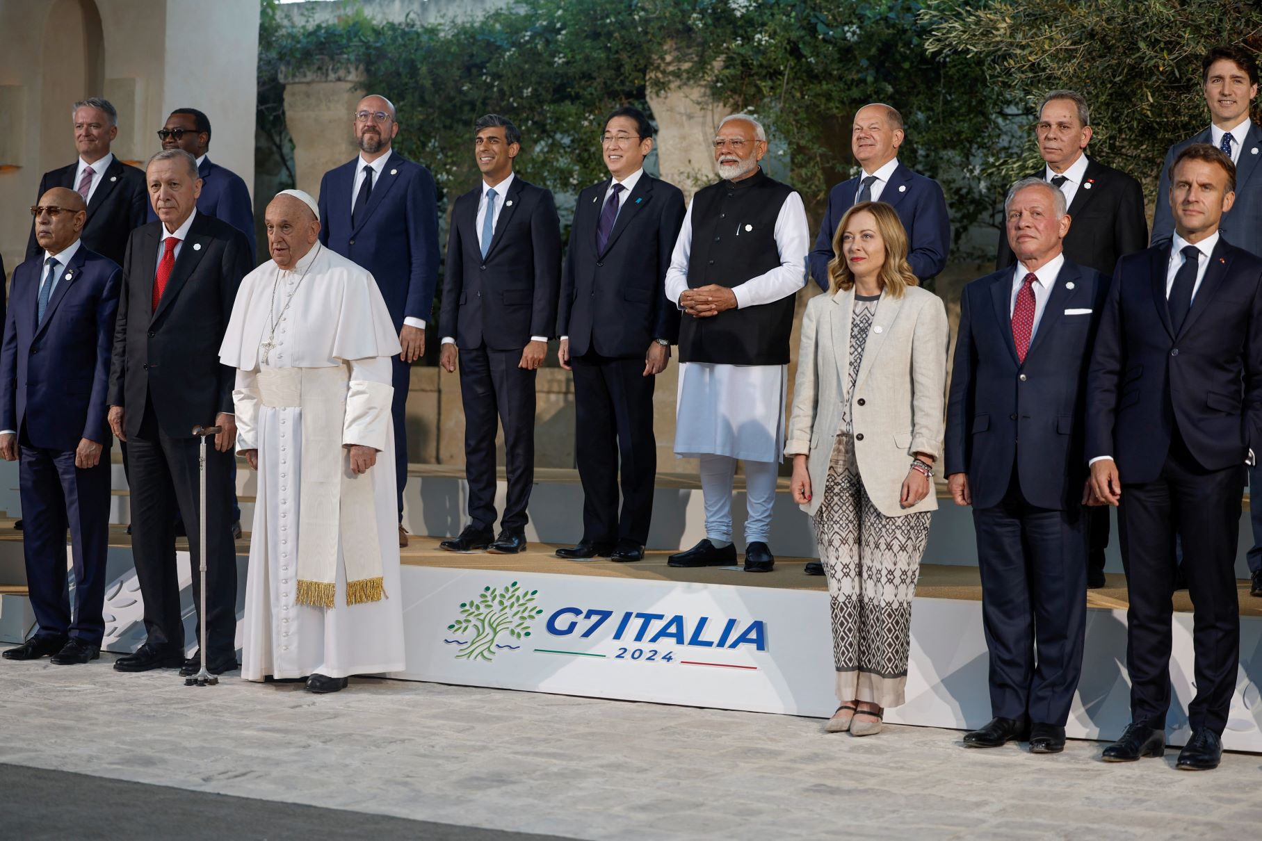 Group of Seven (G7) and invited leaders pose for a family photo on the second day of the G7 summit in Savelletri, Italy on June 14, 2024. REUTERS/Louisa Gouliamaki